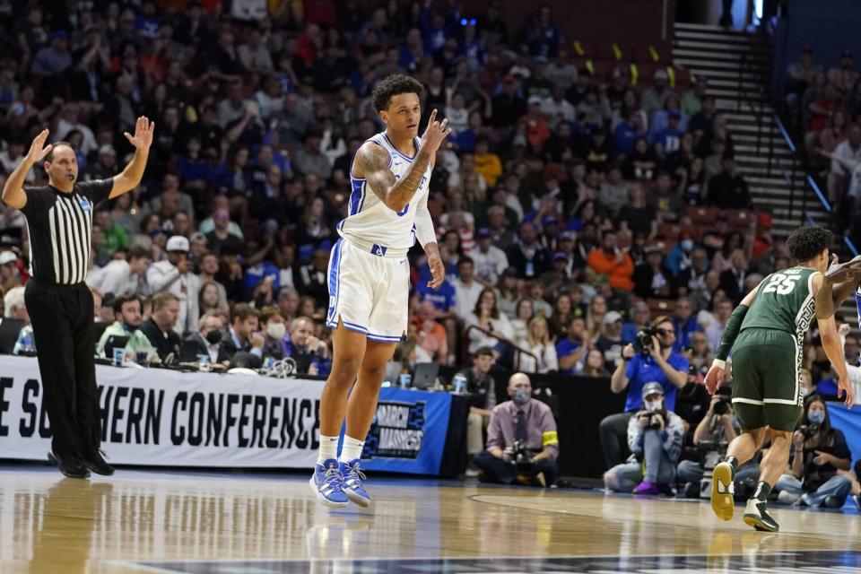 Duke forward Paolo Banchero gestures after hitting a three-pointer against Michigan State on Sunday.