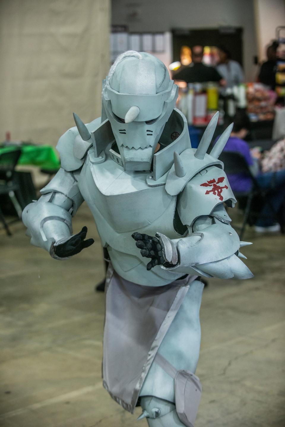 A fan cosplays as Alphonse Elric of "Fullmetal Alchemist."