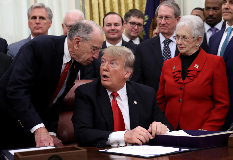 <span class="s1">Sen. Chuck Grassley tells President Trump he needs to leave to cast a vote in the Senate during the signing ceremony for the First Step Act on Dec. 21. Grassley said he had not missed a vote since 1993. (Photo: Win McNamee/Getty Images)</span>