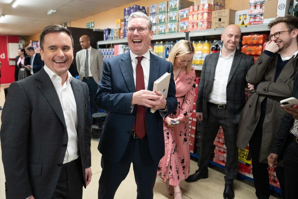 Starmer tours a supermarket in Warrington with Iceland chair Richard Walker (PA)