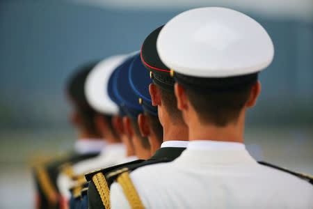 Honour guards stand in line as the plane with Egypt's President Abdel Fattah al-Sisi (unseen) arrives at Hangzhou Xiaoshan international airport before the G20 Summit in Hangzhou, Zhejiang province, China September 3, 2016. REUTERS/Damir Sagolj