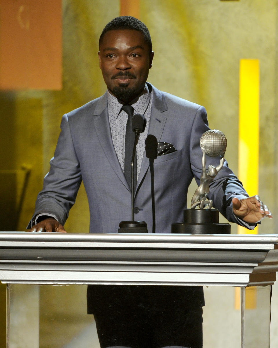 David Oyelowo accepts the award for outstanding supporting actor in a motion picture for "Lee Daniels' The Butler" at the 45th NAACP Image Awards at the Pasadena Civic Auditorium on Saturday, Feb. 22, 2014, in Pasadena, Calif. (Photo by Chris Pizzello/Invision/AP)