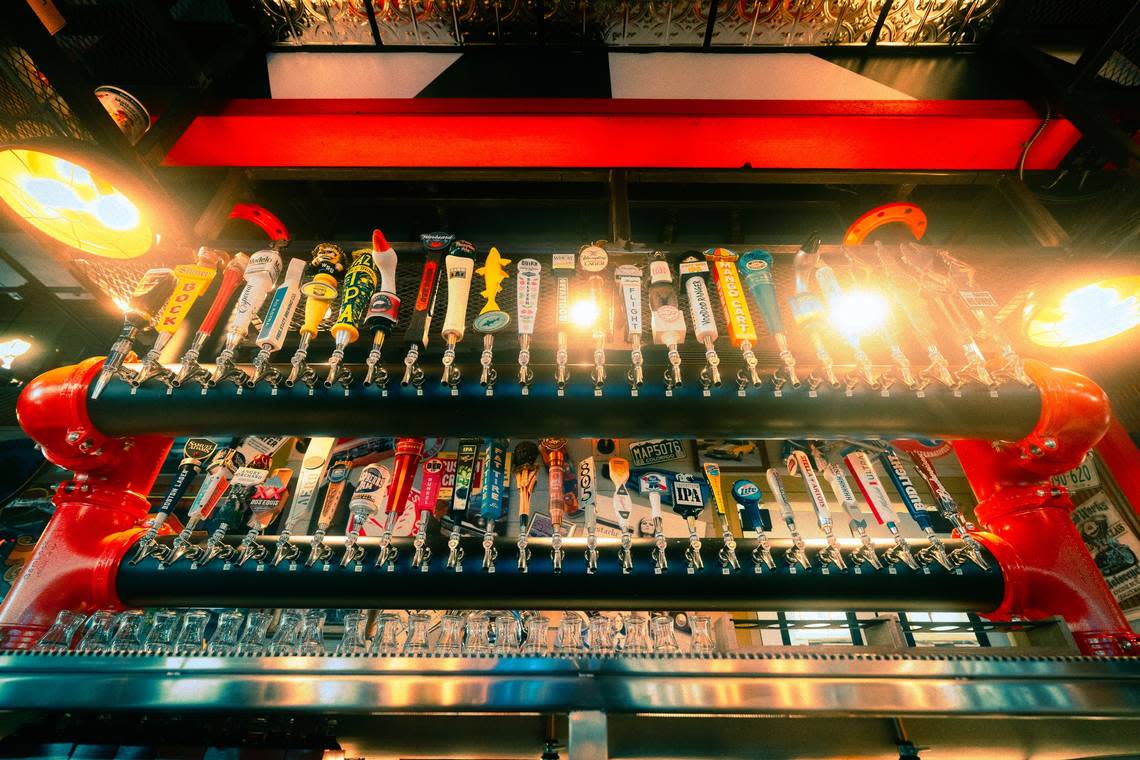 The bar at Sickies Garage offers 50 kinds of beer on tap.