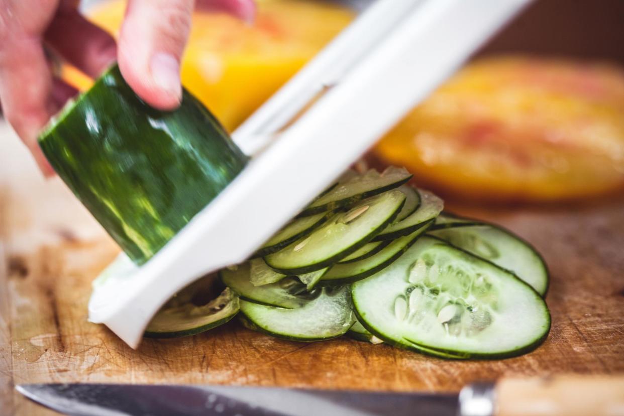 <span>Could Big Mandoline be behind the sudden viral cucumber salad trend? Either way, best use a finger guard when slicing and dicing.</span><span>Photograph: Enrique Díaz/7cero/Getty Images</span>