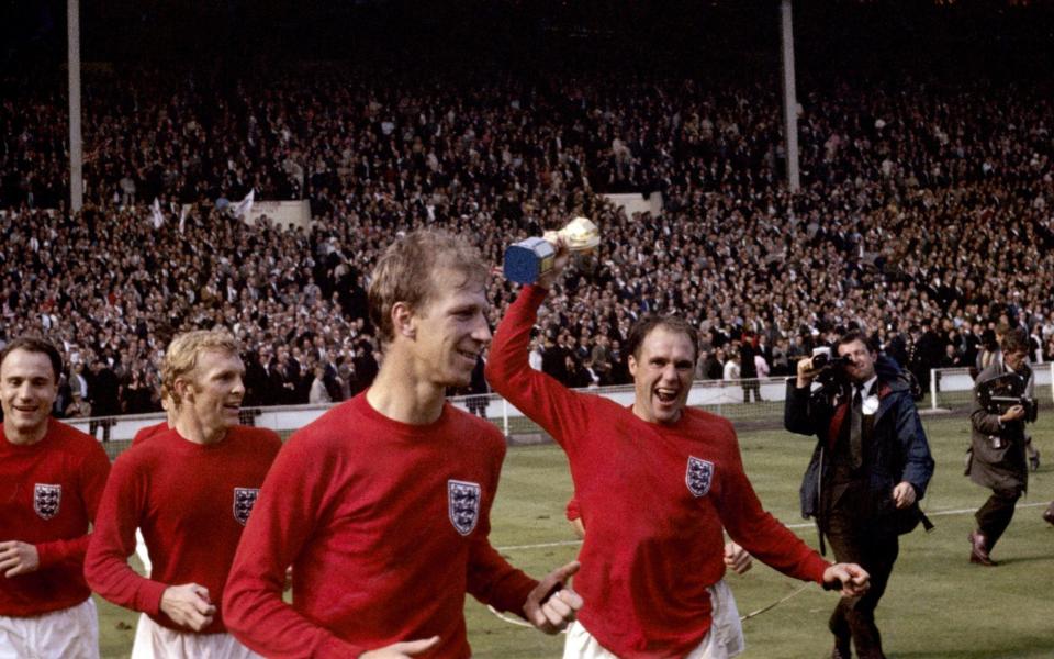World champions: l-r, George Cohen, Bobby Moore, Charlton and Ray Wilson - PA