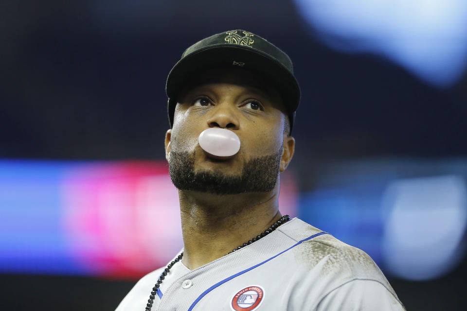 MIAMI, FLORIDA - MAY 18:  Robinson Cano #24 of the New York Mets looks on during the game against the Miami Marlins at Marlins Park on May 18, 2019 in Miami, Florida. (Photo by Michael Reaves/Getty Images)