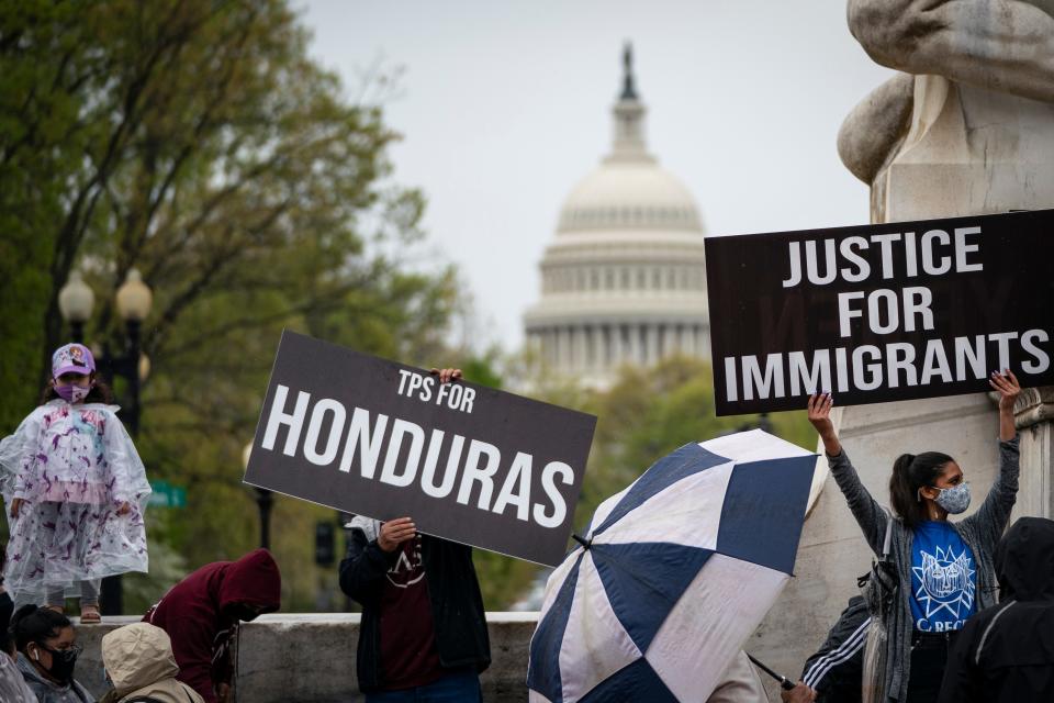 Activists and holders of temporary protected status (TPS) rally near Capitol Hill calling for Congress to pass the Safe Environment from Countries Under Repression and in Emergency (SECURE) Act on April 14, 2021, in Washington, D.C. The SECURE Act would allow qualified TPS recipients to apply for legal permanent residency.