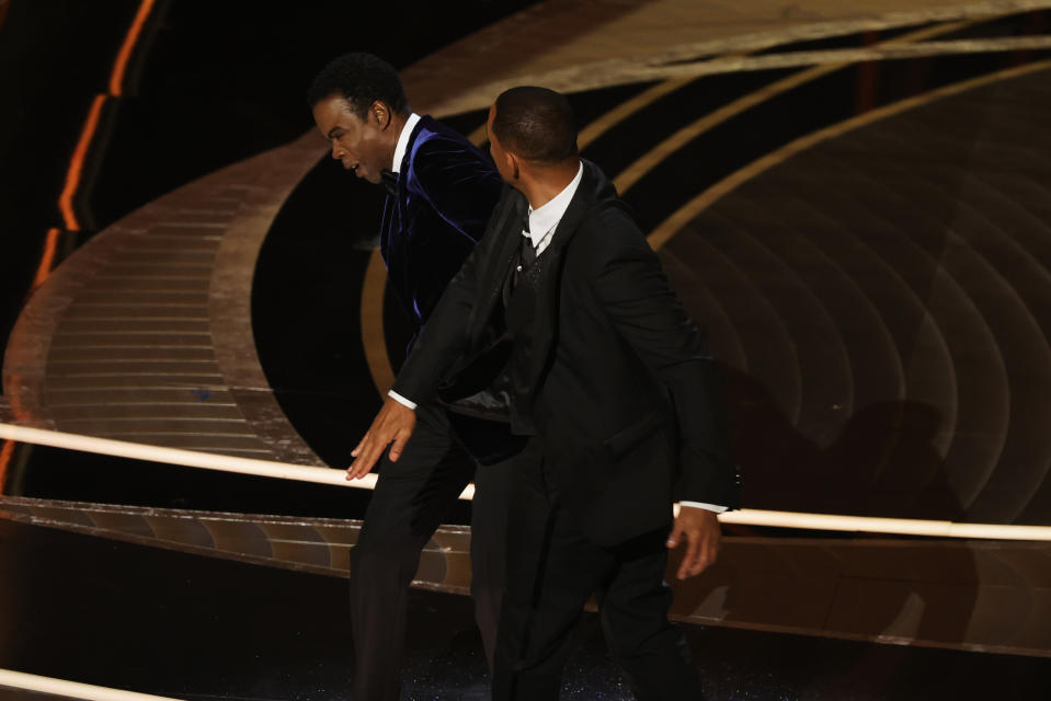 HOLLYWOOD, CALIFORNIA - MARCH 27: Will Smith appears to slap Chris Rock onstage during the 94th Annual Academy Awards at Dolby Theatre on March 27, 2022 in Hollywood, California. (Photo by Neilson Barnard/Getty Images)