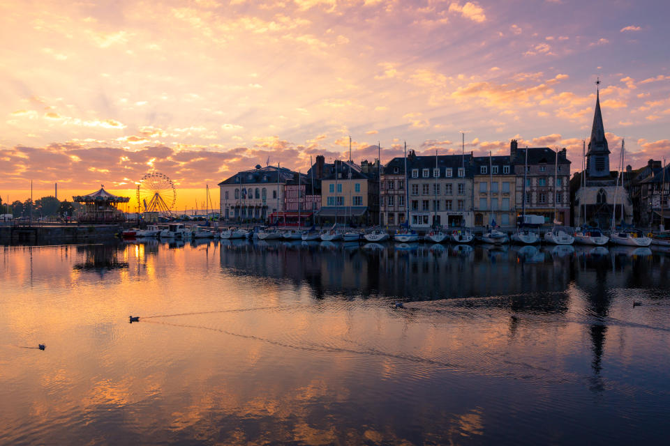 The sun sets over Deauville harbour (Getty Images)