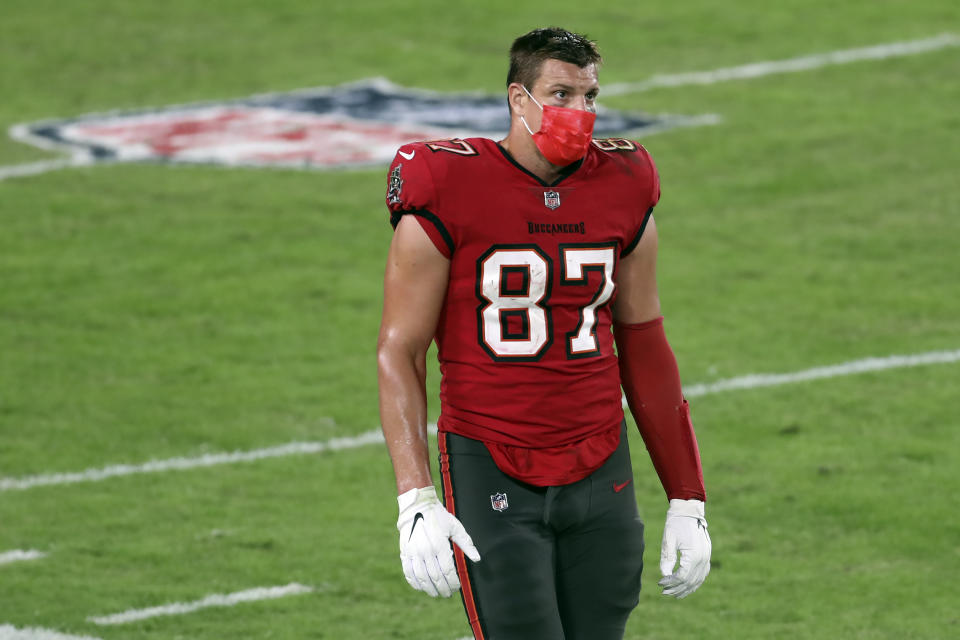 Tampa Bay Buccaneers tight end Rob Gronkowski (87) wears a ptotective face mask as he walks the sideline against the Kansas City Chiefs during the second half of an NFL football game Sunday, Nov. 29, 2020, in Tampa, Fla. (AP Photo/Mark LoMoglio)