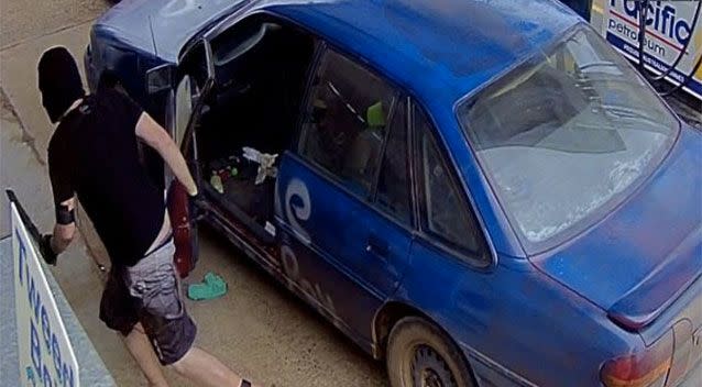 Police say a car parked at a service station before a man went inside the store armed with a machete. Source: Queensland Police Service