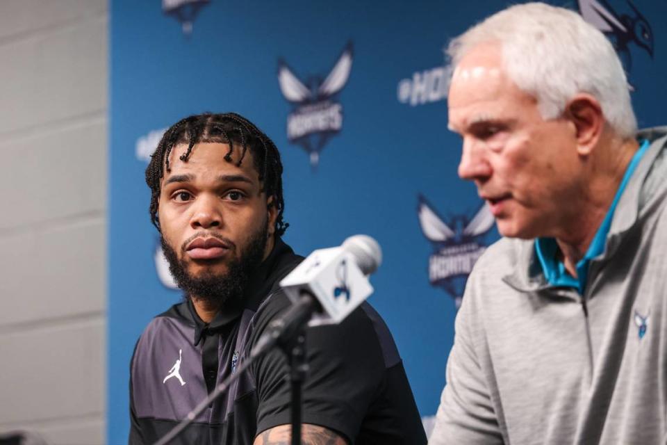 Hornets forward Miles Bridges, left, sits next to President of Basketball Operations and General Manager, Mitch Kupchak,as they answer media questions regarding Bridges’ returning to the Hornets after signing his qualifying offer at Spectrum Center on Tuesday, July 18, 2023.