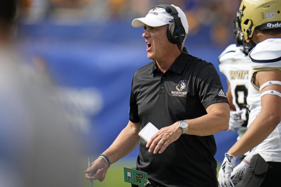 Wofford head coach Shawn Watson gives instructions during the first half of an NCAA college football game against Pittsburgh in Pittsburgh Saturday, Sept. 2, 2023. (AP Photo/Gene J. Puskar)