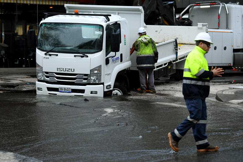 A truck stuck in a sinkhole at Double Bay in Sydney.