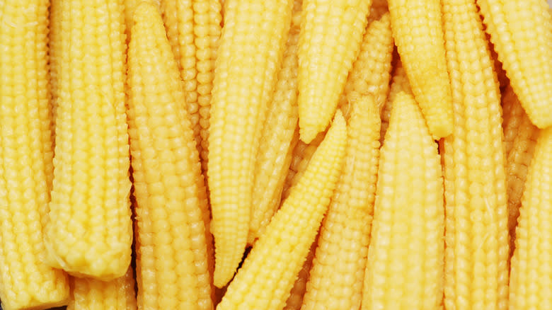 close-up of baby corn stacked sideways