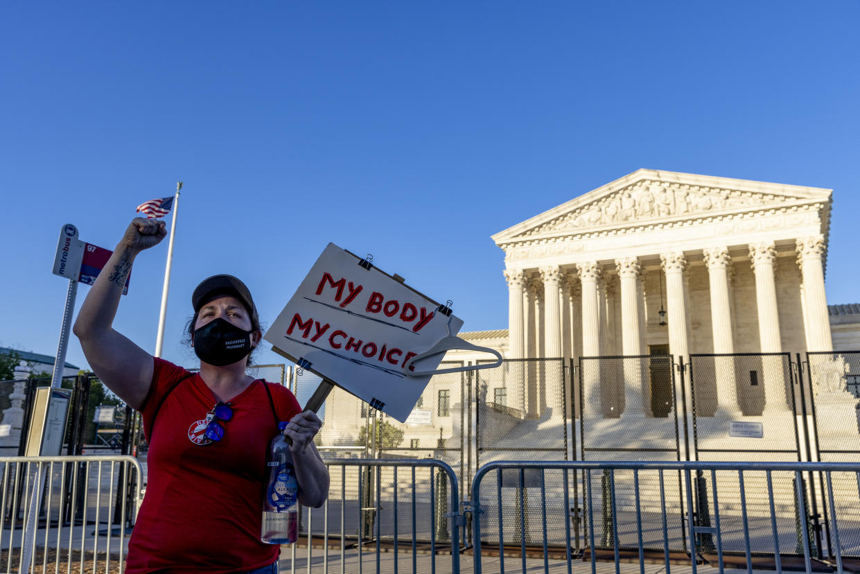 An abortion rights demonstrator in front of the U.S. Supreme Court building. 