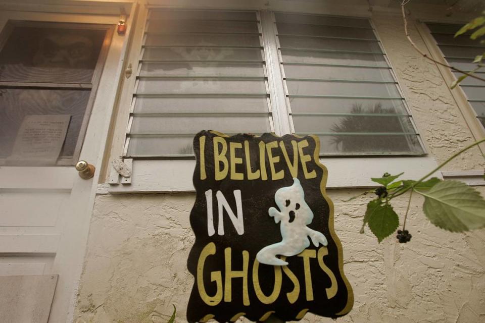 A sign reading “I believe in Ghosts” stands outside the Cassadaga, Fla. house owned by Victor Vogenitz, Saturday, Oct. 27, 2007.