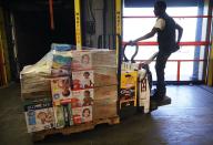 <p>Workers at the Bronx Food Bank headquarters fill trucks with bottled water, diapers, personal care items, and food for a direct flight to aid Puerto Rico after Hurricane Maria on September 29, 2017.</p><p><strong>RELATED: </strong><a href="https://www.redbookmag.com/life/g4595/beautiful-nature-photos-around-the-world/" rel="nofollow noopener" target="_blank" data-ylk="slk:50 Natural Photos That You Won't Believe Aren't Photoshopped;elm:context_link;itc:0;sec:content-canvas" class="link "><strong>50 Natural Photos That You Won't Believe Aren't Photoshopped</strong></a></p>