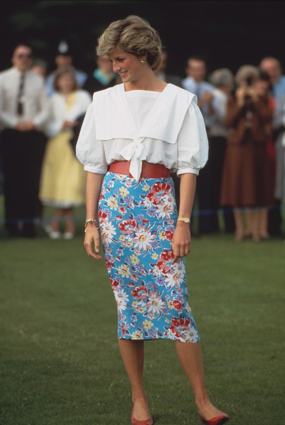 princess diana in a white shirt and floral skirt