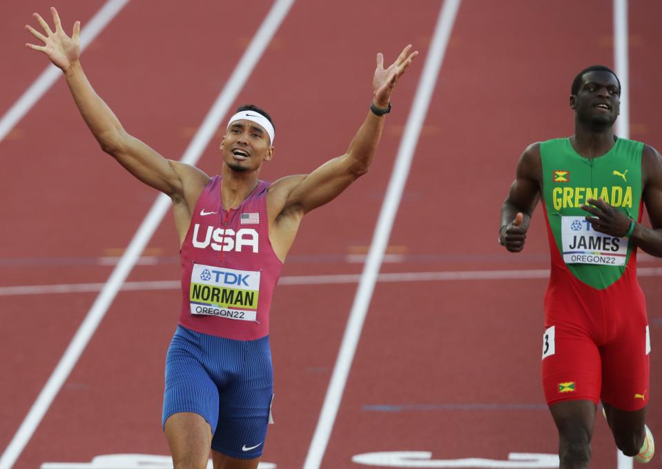 USA's Michael Norman, left, celebrates his victory in the men's 400 meters with second place finisher Grenada's Kirani James, right, during day eight of the World Athletics Championships at Hayward Field in Eugene, Oregon Friday July 22, 2022. 