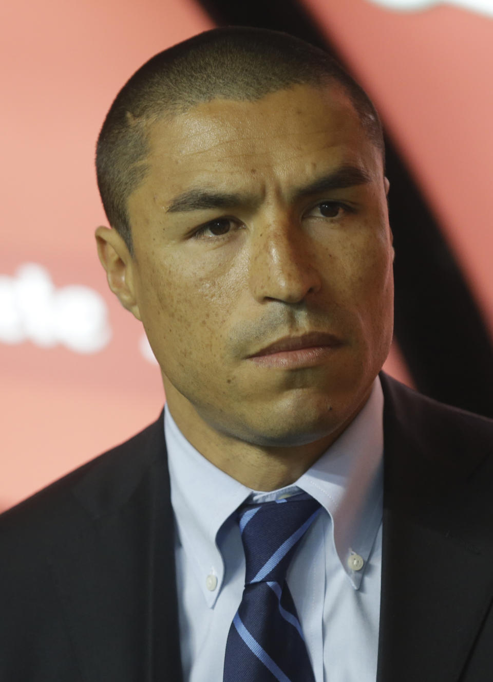 Inter Milan general manager Ivan Ramiro Cordoba watches during a Serie A soccer match between Inter Milan and Napoli, at the San Siro stadium in Milan, Italy, Saturday, April 26, 2014. (AP Photo/Luca Bruno)