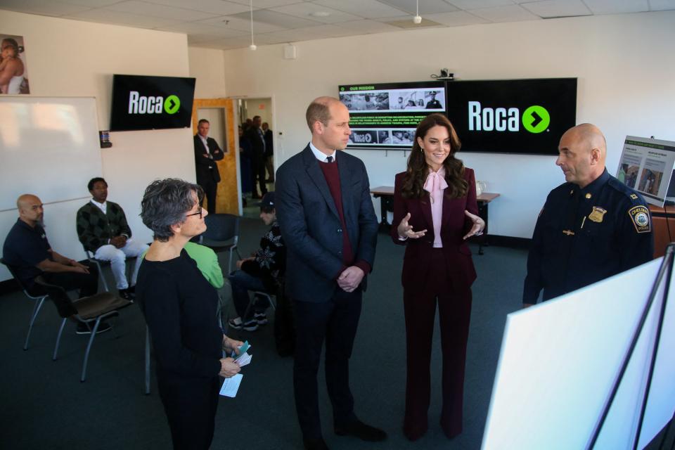 Prince William, Prince of Wales, and Catherine, Princess of Wales, meet with Molly Baldwin (L) founder of Roca and Chelsea Police Captain Dave Batchelor (R) (POOL/AFP via Getty Images)