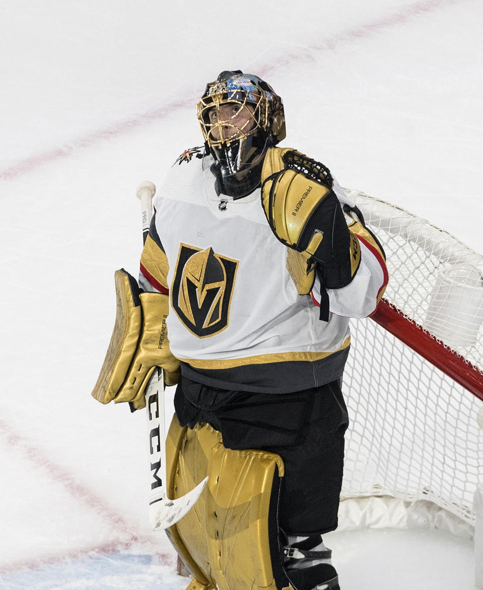 Vegas Golden Knights goalie Marc-Andre Fleury (29) reacts to the win over the Chicago Blackhawks in an NHL hockey Stanley Cup first-round playoff series, Saturday, Aug. 15, 2020, in Edmonton, Alberta. (Jason Franson/The Canadian Press via AP)