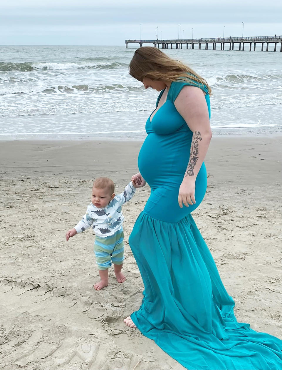 Madelynn walks on the beach while pregnant with Asher. (Courtesy Madelynn Ballenger )