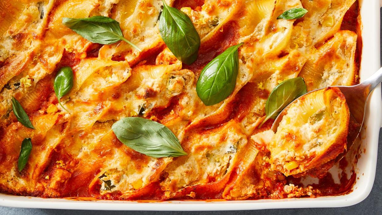 stuffed shells with sauce filled with cheese