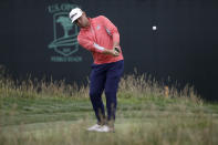 Gary Woodland chips off the 17th green during the final round of the U.S. Open Championship golf tournament Sunday, June 16, 2019, in Pebble Beach, Calif. (AP Photo/Marcio Jose Sanchez)