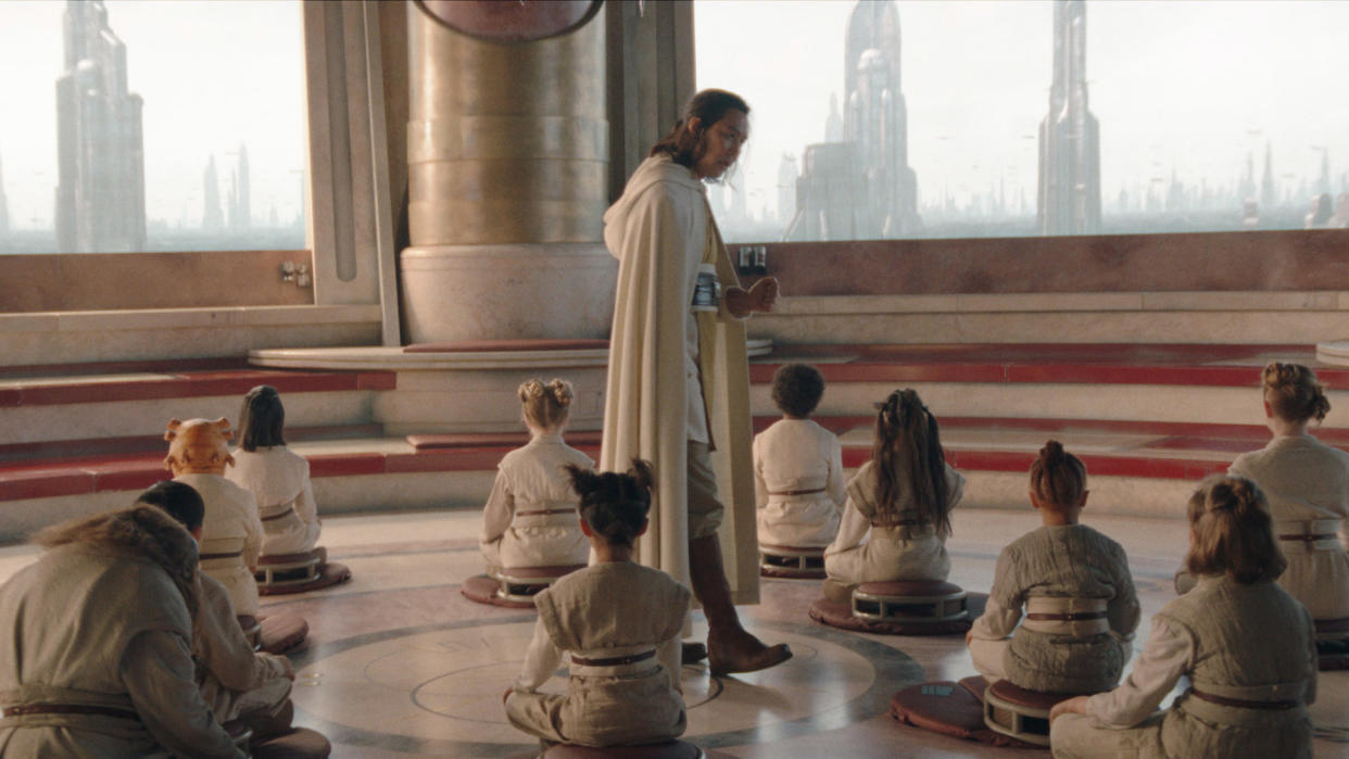  Master Sol speaks to a number of seated Younglings at the Jedi Temple on Coruscant in Star Wars: The Acolyte. 