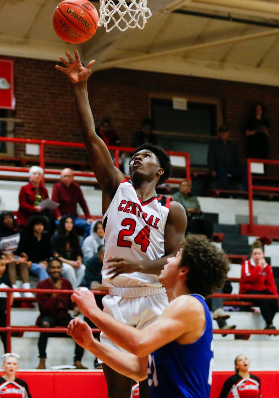 Central Bulldog Bryce Walker tosses up a field goal as they take on the Carthage Tigers in The Pit at Central High School on Tuesday, Dec. 13, 2022.