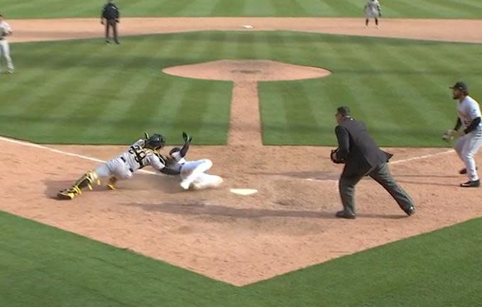 Pirates catcher Francisco Cervelli appears to tag Detroit’s Nick Castellanos just before he touched home. (MLB.TV)