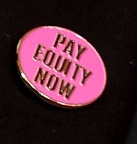 Pink badge with 