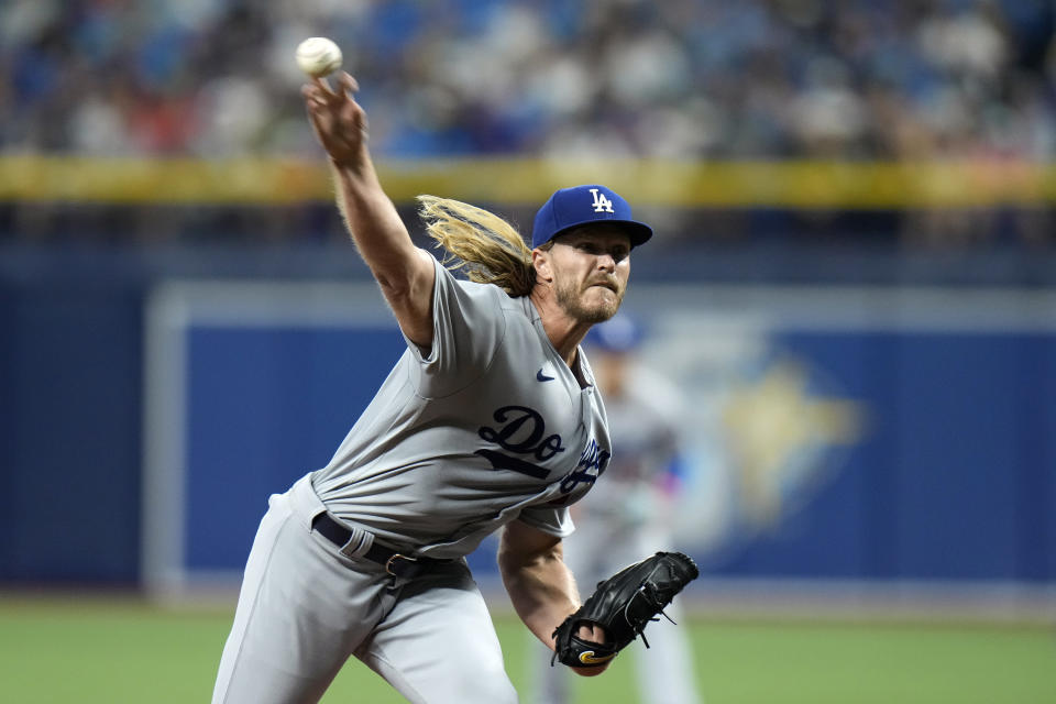 Los Angeles Dodgers starting pitcher Noah Syndergaard delivers to the Tampa Bay Rays during the first inning of a baseball game Friday, May 26, 2023, in St. Petersburg, Fla. (AP Photo/Chris O'Meara)