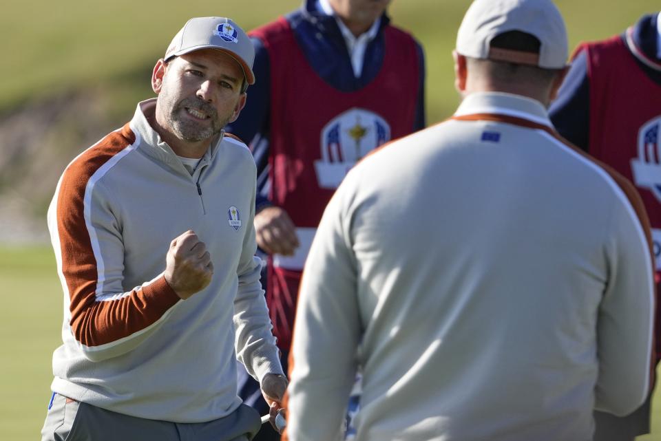 Team Europe's Sergio Garcia reacts to a putt on the eighth hokle during a foursomes match the Ryder Cup at the Whistling Straits Golf Course Saturday, Sept. 25, 2021, in Sheboygan, Wis. (AP Photo/Jeff Roberson)