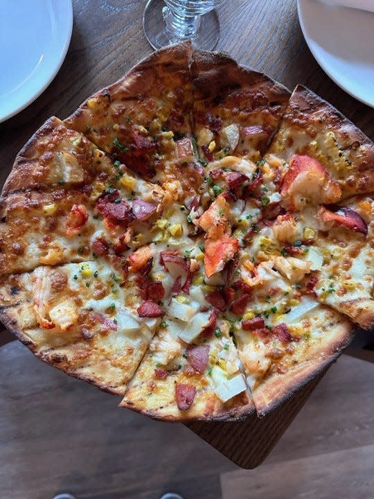 Bluefish River Tavern in Duxbury recently opened at the site of the Milepost restaurant. The restaurant's menu offers surprises, such as this boiled lobster flatbread.