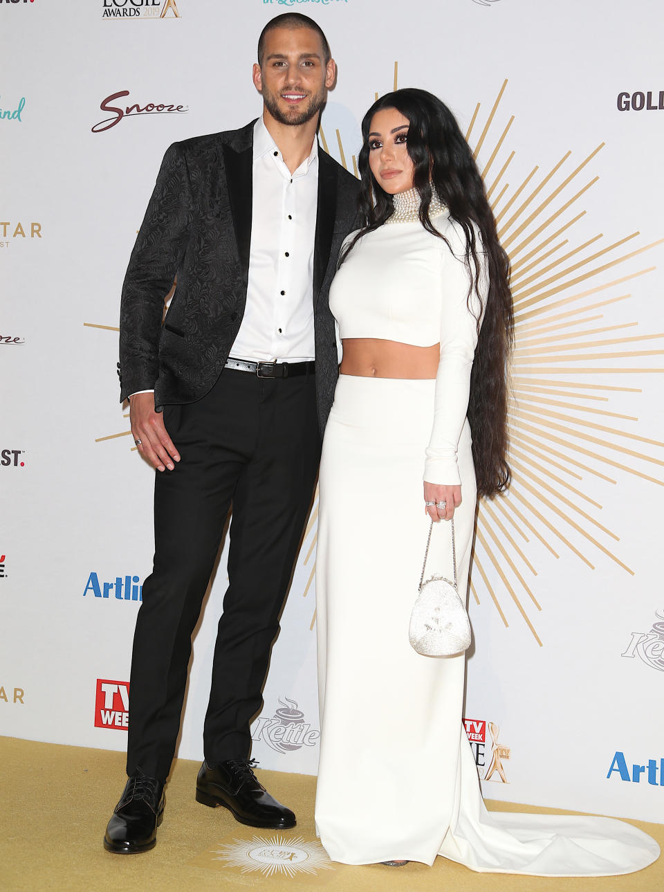 MAFS couple Martha Kalifatidis and Michael Brunelli pose on the red carpet at the Australian TV awards. Photo: Getty 