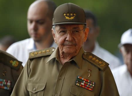 Cuba's president Raul Castro arrives for an event marking the 1953 assault on the Moncada military barracks, in Artemisa province, near Havana July 26, 2014. REUTERS/Enrique De La Osa