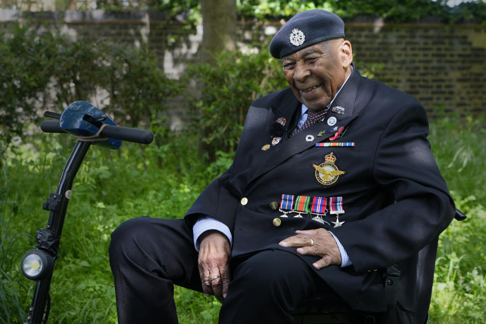 Gilbert Clarke a D-Day veteran smiles as he is interviewed near his home in east London, Wednesday, May 15, 2024. Clarke, now 98, is one of more than 3 million men and women from South Asia, Africa and the Caribbean who served in the British military during World War II. (AP Photo/Kirsty Wigglesworth)