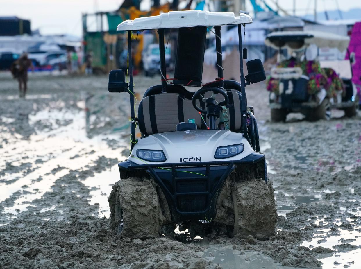 Abandoned vehicles block a few intersections at Burning Man, where organizers have banned all non-emergency driving.