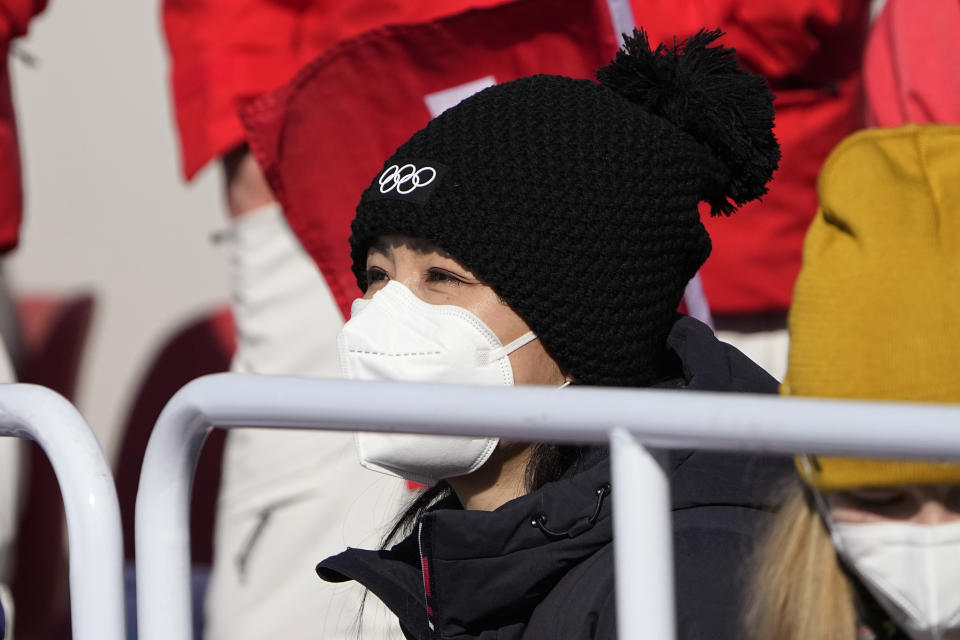 China's Peng Shuai watches the women's freestyle skiing big air finals at the 2022 Winter Olympics, Tuesday, Feb. 8, 2022, in Beijing. (AP Photo/Jae C. Hong)