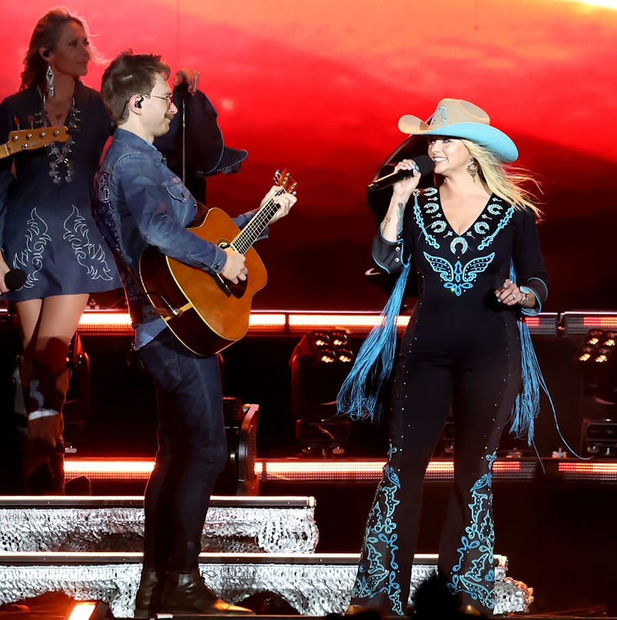 reba mcentire, cowboy hat, fringe, denim outfit with rhinestones and beads, INDIO, CALIFORNIA - APRIL 27: (FOR EDITORIAL USE ONLY) Miranda Lambert performs at the T-Mobile Mane Stage during the 2024 Stagecoach Festival at Empire Polo Club on April 27, 2024 in Indio, California. (Photo by Amy Sussman/Getty Images for Stagecoach)