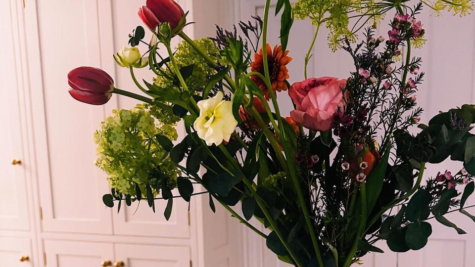 A photo of a vase on a white marble surface