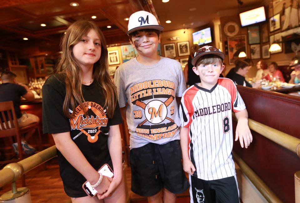 Ella Smith, Danny Nichols and Kieran Smith at the Boston Tavern on Wednesday, Aug. 17, 2022 during a watch party for the opening game of the Little League World Series for the Middleboro U12 All Stars. Middleboro, representing New England, played Nolensville, Tennessee out of the Southeast. 