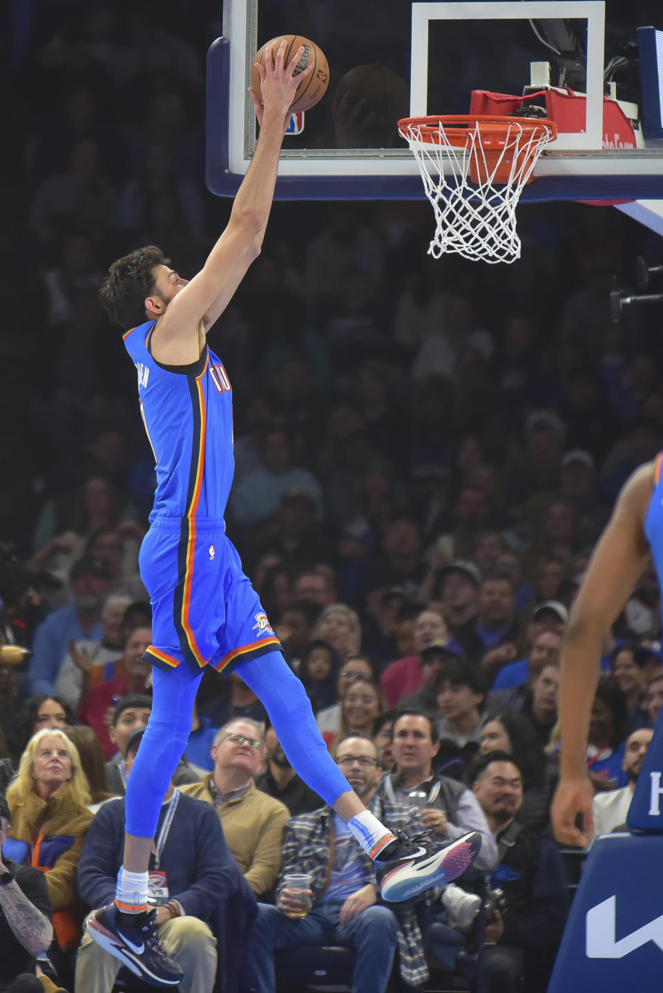 Oklahoma City Thunder forward Chet Holmgren dunks against the Minnesota Timberwolves during the first half of an NBA basketball game Tuesday, Dec. 26, 2023, in Oklahoma City. (AP Photo/Kyle Phillips)