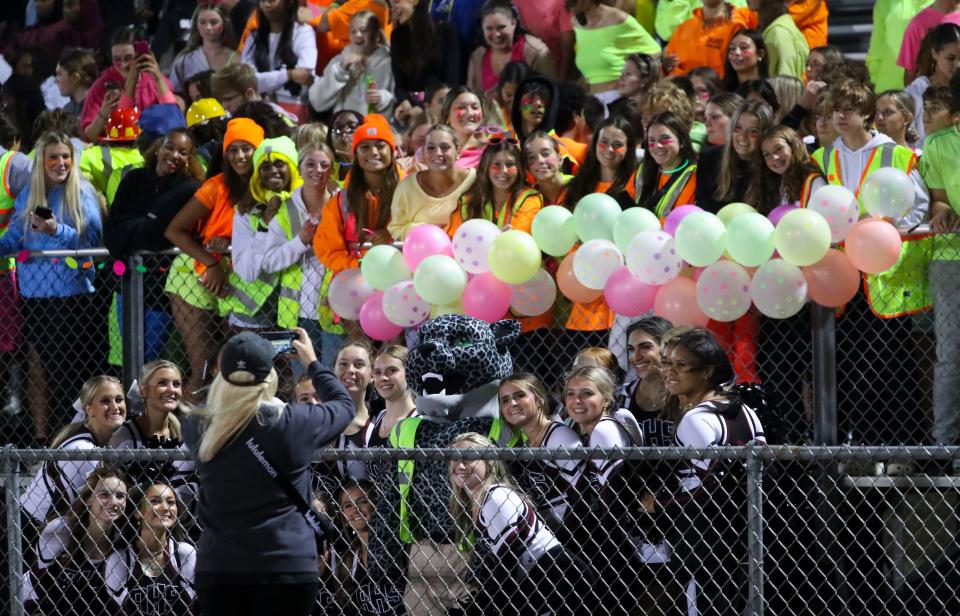 Appoquinimink fans and cheerleaders pose with the Jaguar mascot in the first half of the Jaguars' 19-14 win against St. Georges at Appoquinimink, Friday, Sept. 22, 2023.