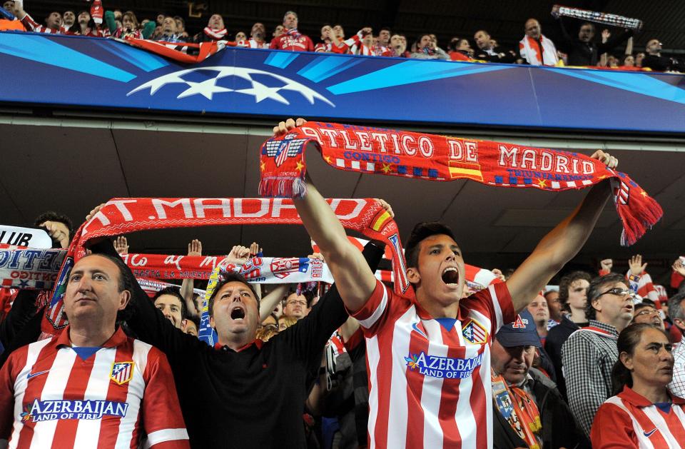 Atletico Madrid fans show their support in the stands during the Champions League semifinal second leg soccer match between Chelsea and Atletico Madrid at Stamford Bridge Stadium in London, Wednesday, April 30, 2014. (AP Photo/Andrew Matthews, PA Wire) UNITED KINGDOM OUT - NO SALES - NO ARCHIVES