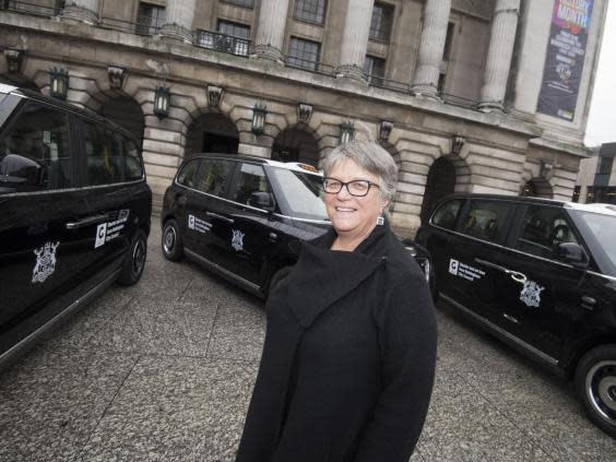 Councillor Sally Longford with Nottingham’s electrified taxi fleet (Nottingham City Council)