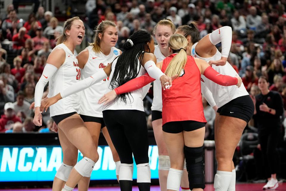 Dec 2, 2022; Columbus, Ohio, USA;  The Ohio State Buckeyes celebrate a point during the second set of NCAA women's volleyball tournament first round match against the Tennessee State Tigers at the Covelli Center. Mandatory Credit: Adam Cairns-The Columbus Dispatch